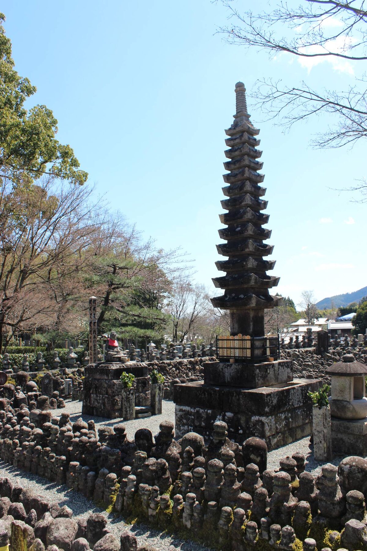 Stone pagoda surrounded by thousands of small stone statues at Adashino Nenbutsu-ji in Arashiyama