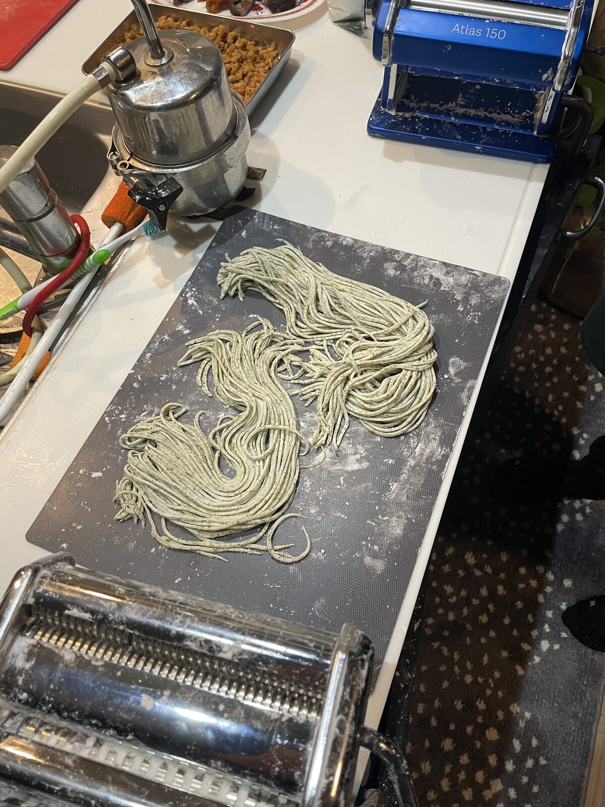 Homemade ramen noodles cut with a pasta machine during a vegan ramen cooking class in Tokyo
