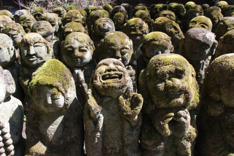 Moss-covered rakan statues at Otagi Nenbutsu-ji, my favourite of all things to do in Arashiyama