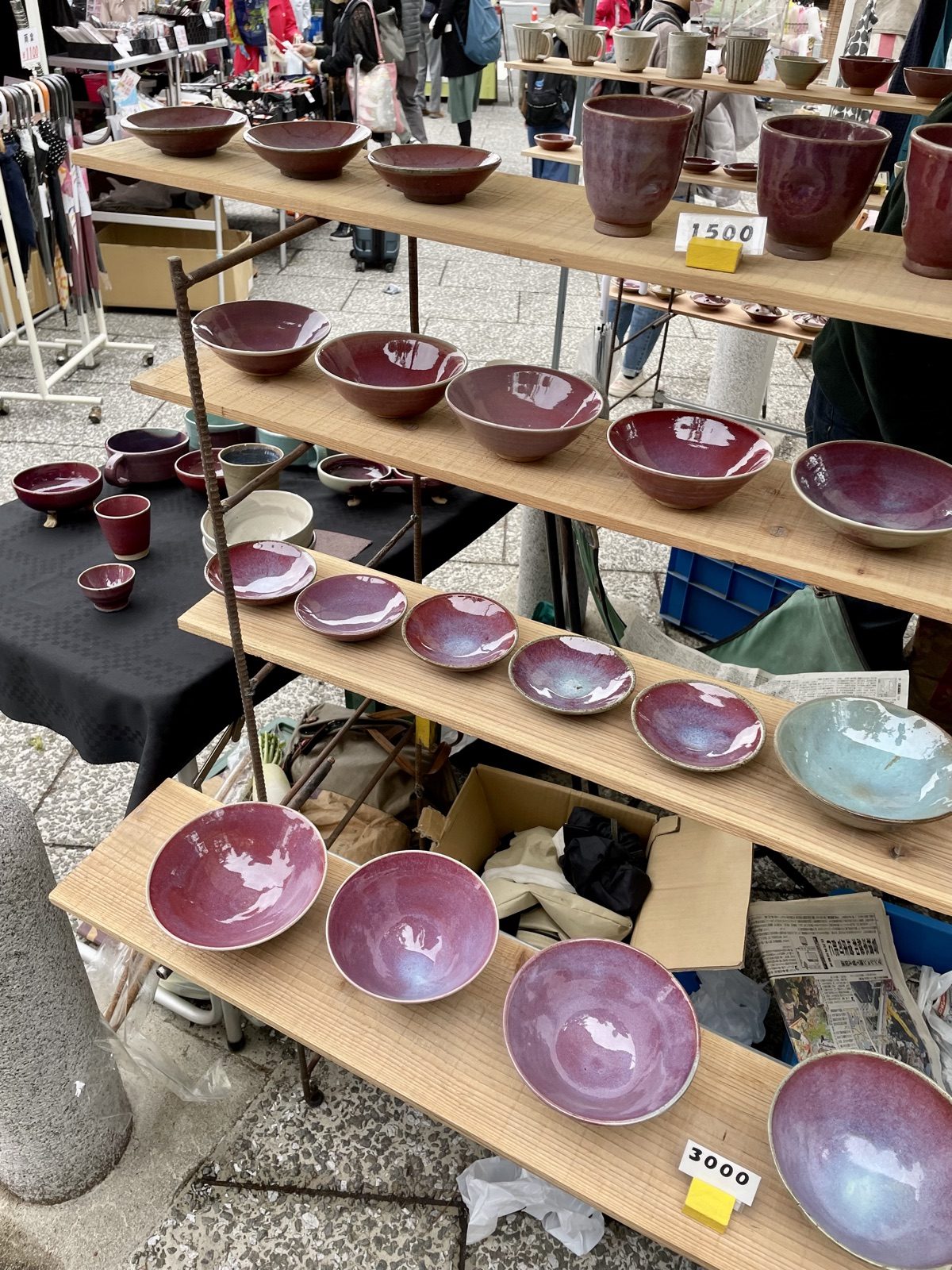 Glazed ceramic bowls for sale at the Tenjin-san flea market in Kyoto
