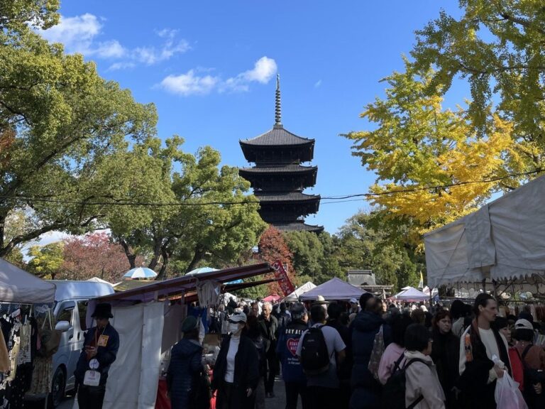Kyoto flea market at Toji Temple with stalls in front of the five-storey pagoda